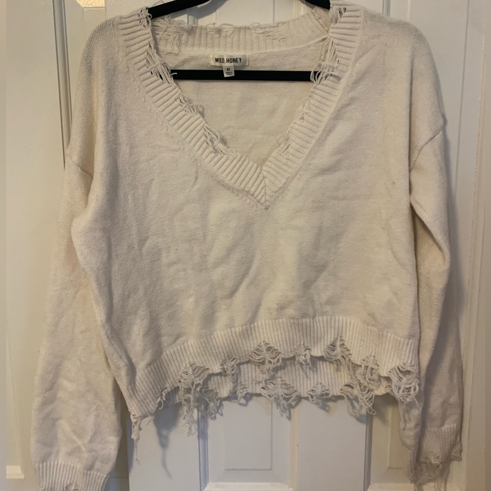 Grey Bandit distressed white sweater